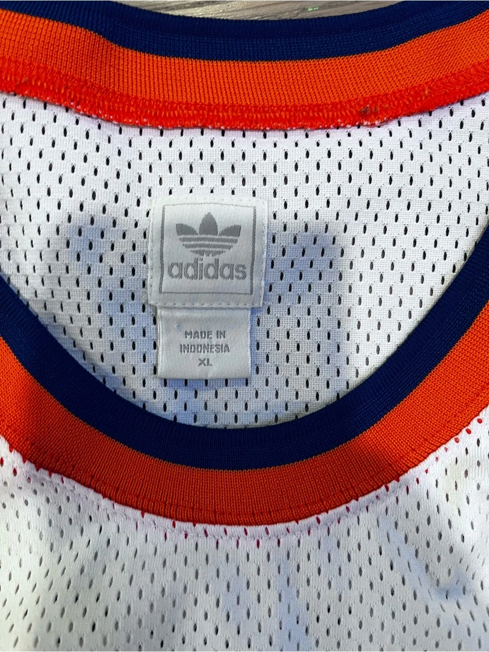 Vintage Patrick Ewing Knicks Basketball Jersey with Orange & Navy Accents #33